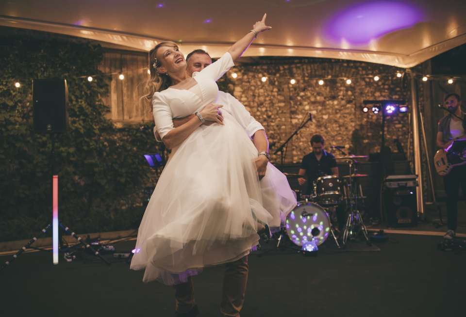 28 Upbeat First Dance Songs for a Fun, Modern Twist