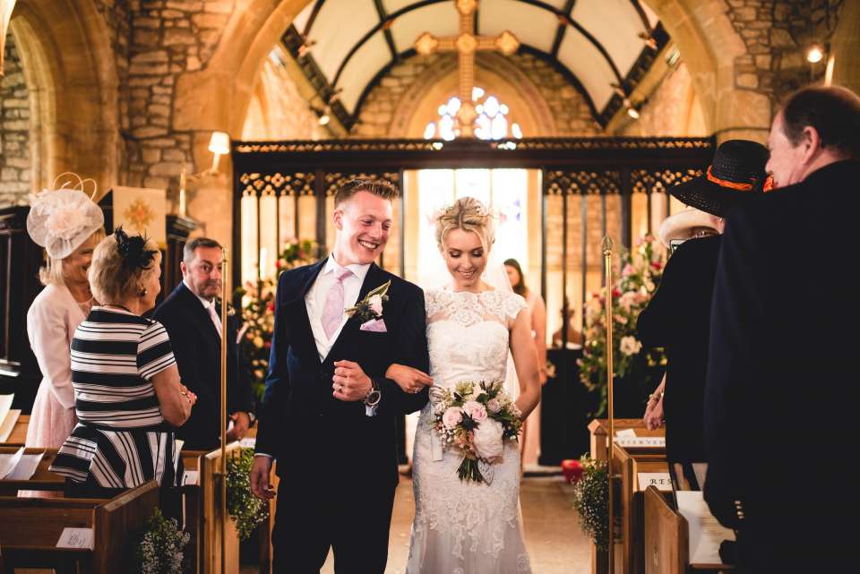41 Modern Wedding Exit Songs to Step into Married Life to